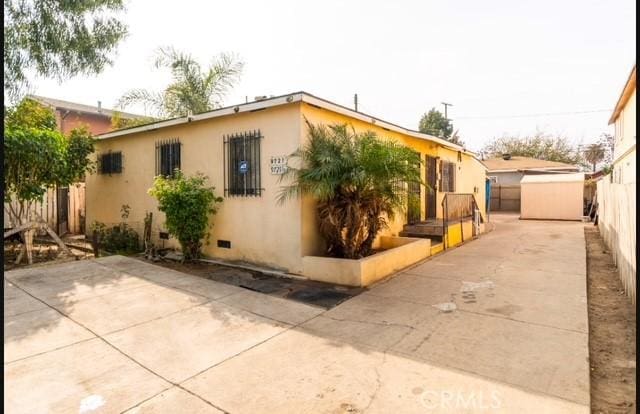 view of home's exterior featuring a patio area