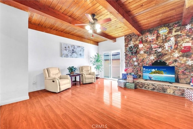 unfurnished room featuring ceiling fan, wood ceiling, beamed ceiling, and light wood-type flooring