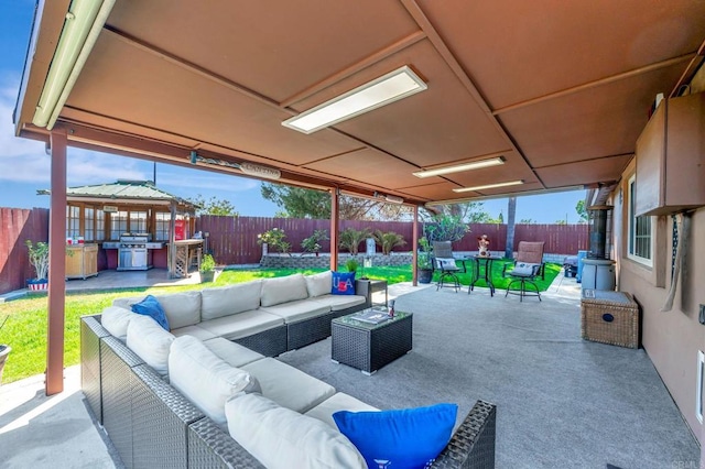 view of patio with an outdoor hangout area and a grill