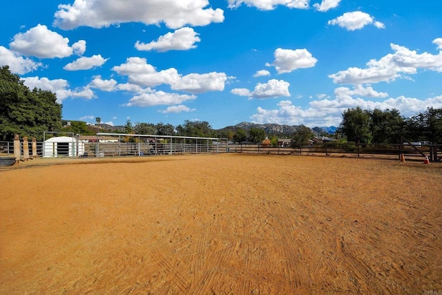 view of property's community featuring a mountain view and a rural view