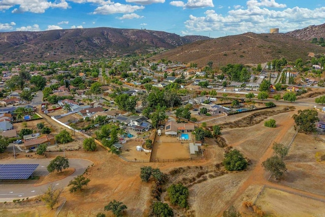 drone / aerial view featuring a mountain view