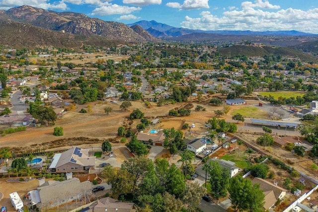 drone / aerial view featuring a mountain view