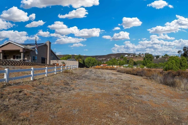 view of yard with a mountain view