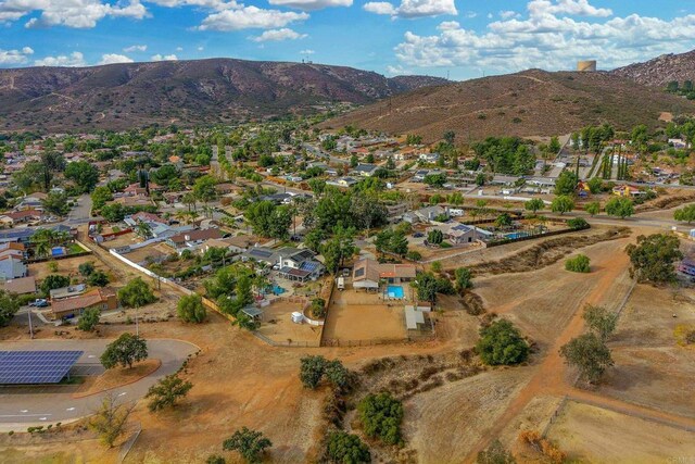 drone / aerial view featuring a mountain view