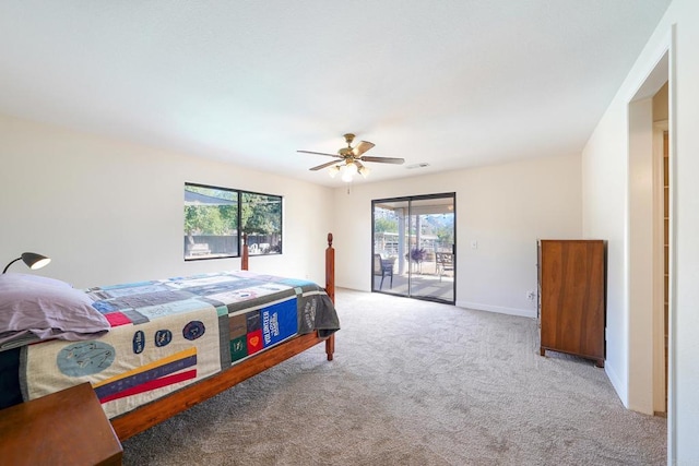 carpeted bedroom featuring access to outside and ceiling fan