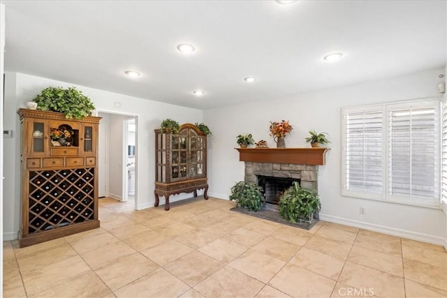 interior space with a stone fireplace