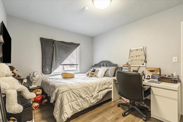 bedroom featuring light hardwood / wood-style flooring