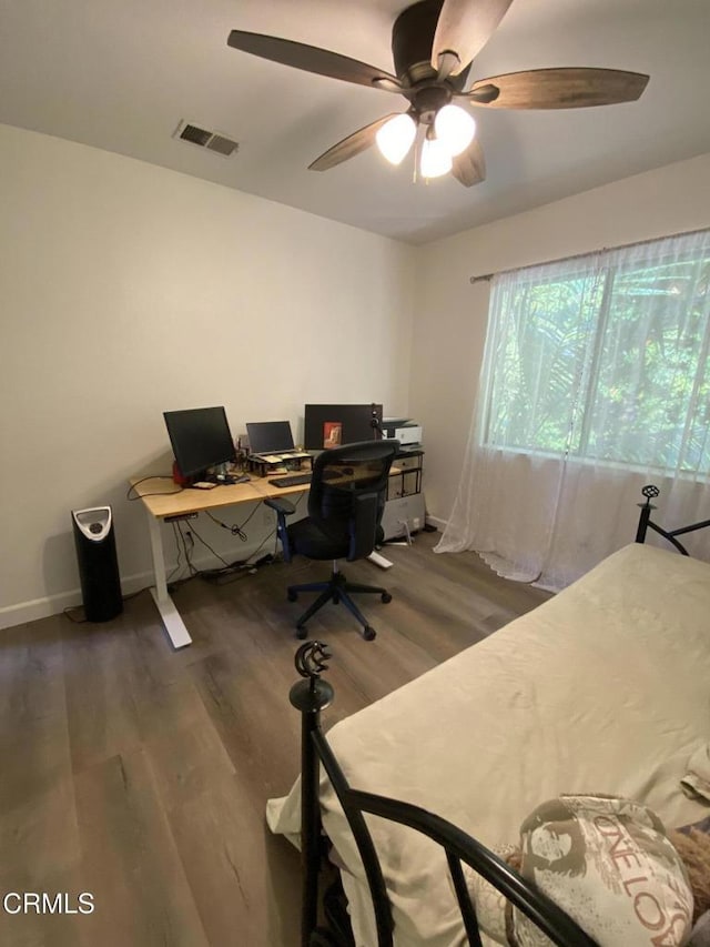 office space featuring ceiling fan and wood-type flooring