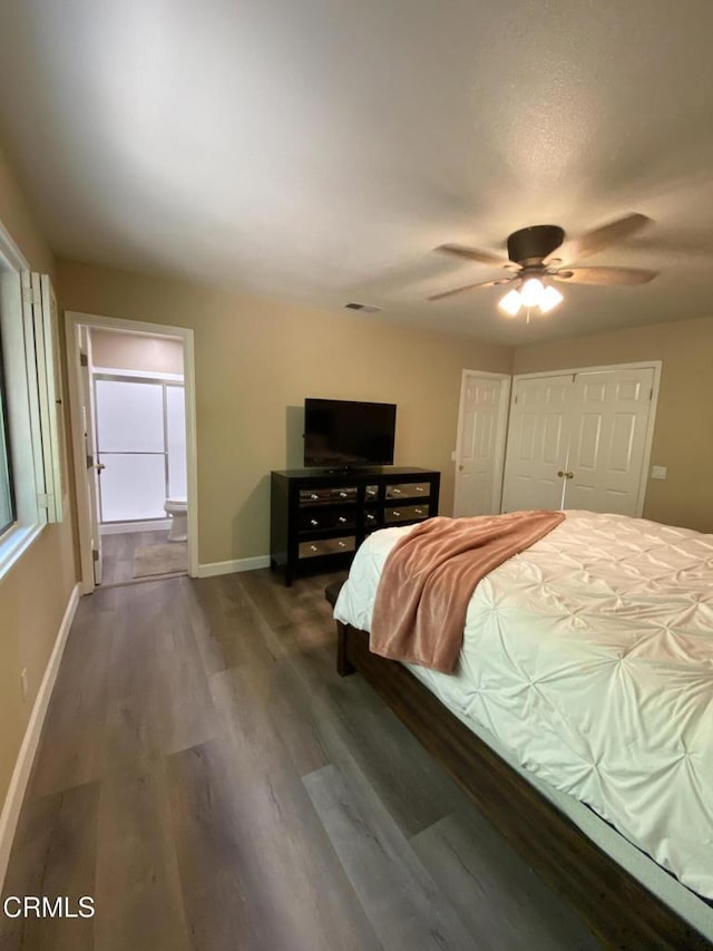 bedroom featuring a closet, dark hardwood / wood-style floors, and ceiling fan