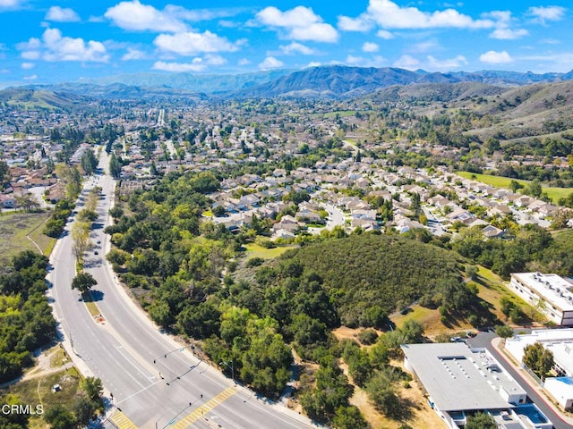 birds eye view of property featuring a mountain view and a residential view