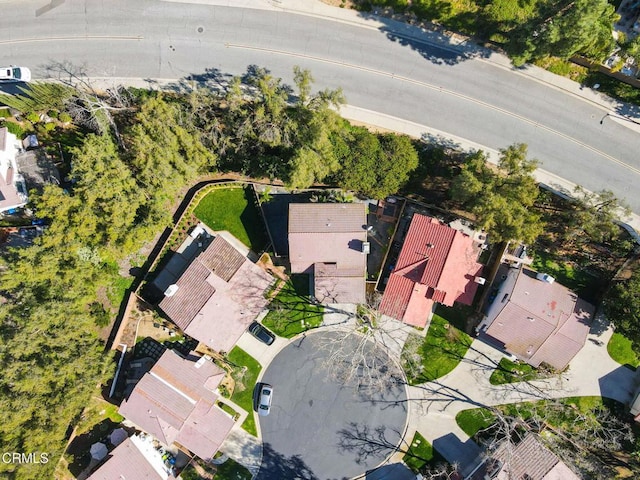 birds eye view of property with a residential view