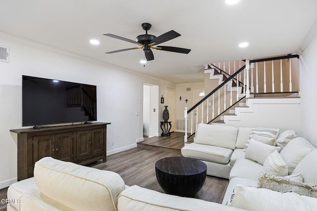 living area featuring wood finished floors, recessed lighting, stairway, crown molding, and baseboards