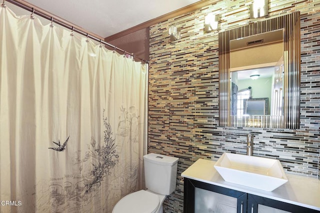 bathroom featuring backsplash, toilet, tile walls, and vanity