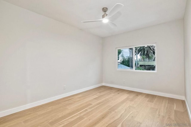 unfurnished room featuring light hardwood / wood-style floors and ceiling fan