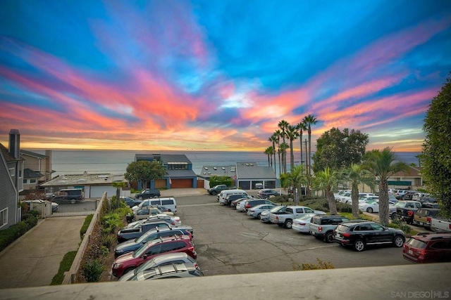 view of parking at dusk