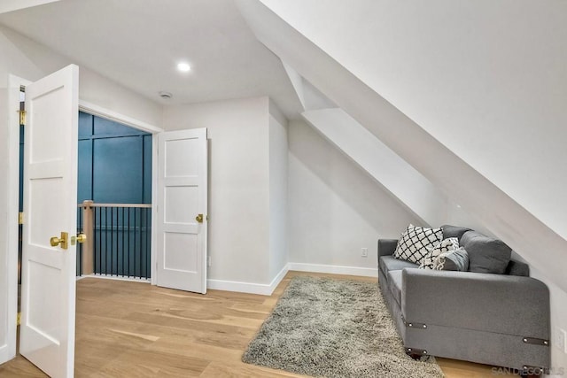 bonus room with hardwood / wood-style flooring