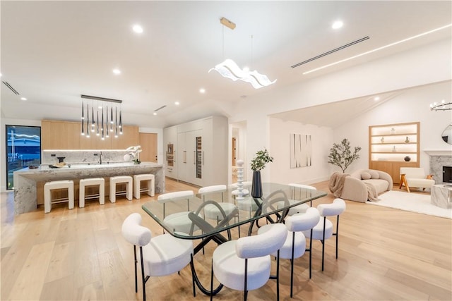 dining area with light hardwood / wood-style flooring