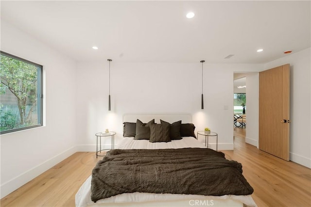 bedroom featuring light hardwood / wood-style flooring