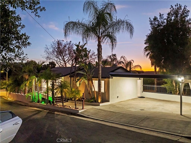 view of front of property with a carport