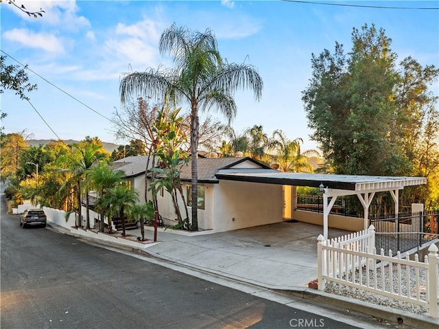 view of front of property with a carport