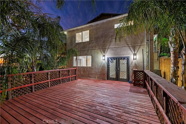 deck at dusk with french doors