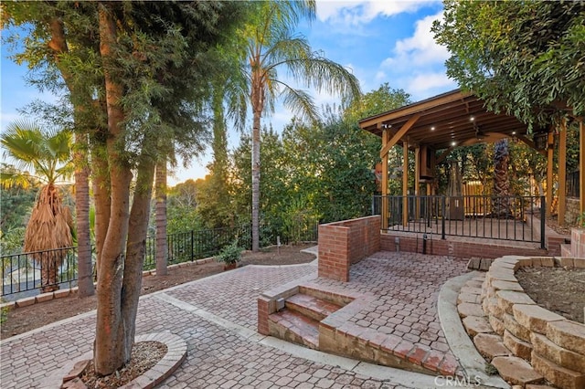 view of patio / terrace with ceiling fan