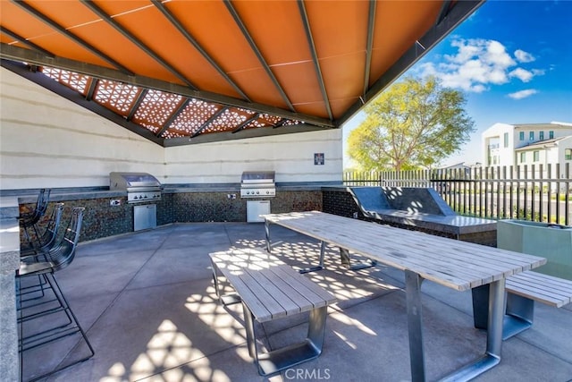 view of patio featuring area for grilling and a gazebo