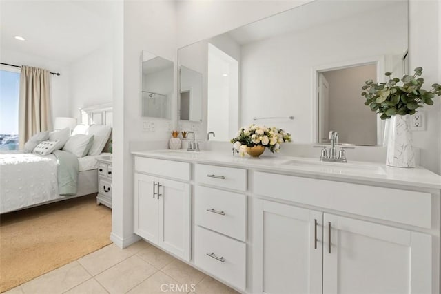 bathroom with vanity and tile patterned floors