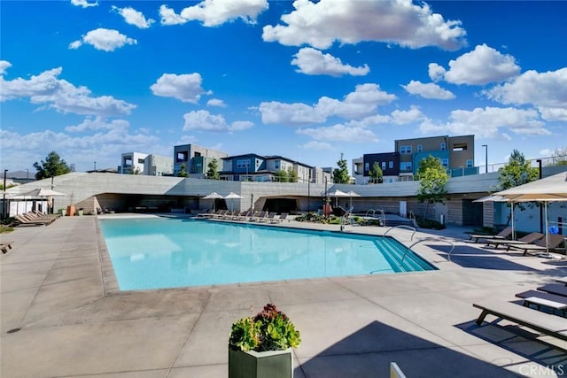 view of swimming pool featuring a patio