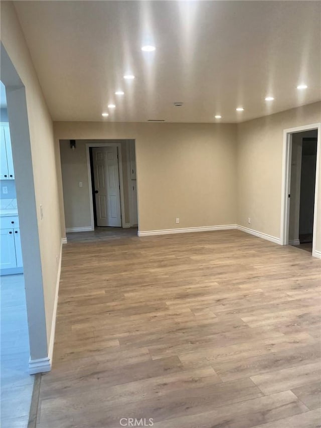 unfurnished room featuring light hardwood / wood-style floors