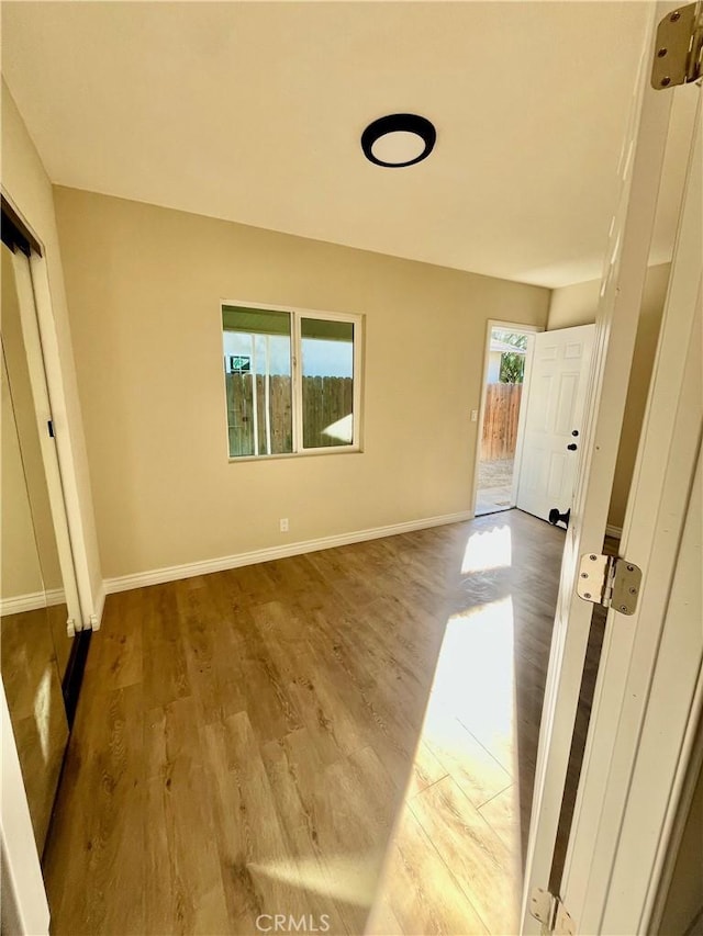 interior space with hardwood / wood-style floors