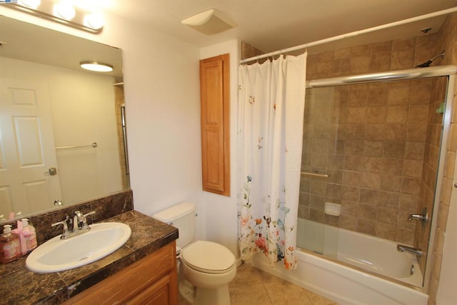 full bathroom with toilet, tile patterned flooring, shower / bath combo, and vanity