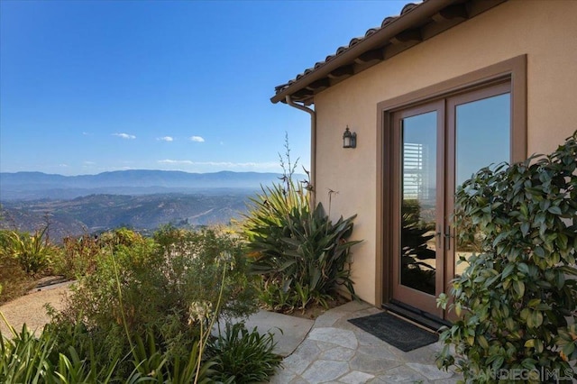 entrance to property with a mountain view