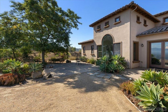 view of home's exterior featuring a patio area