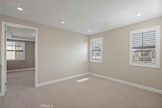 view of carpeted spare room