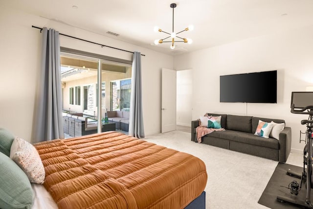 bedroom with light carpet, access to exterior, and a notable chandelier