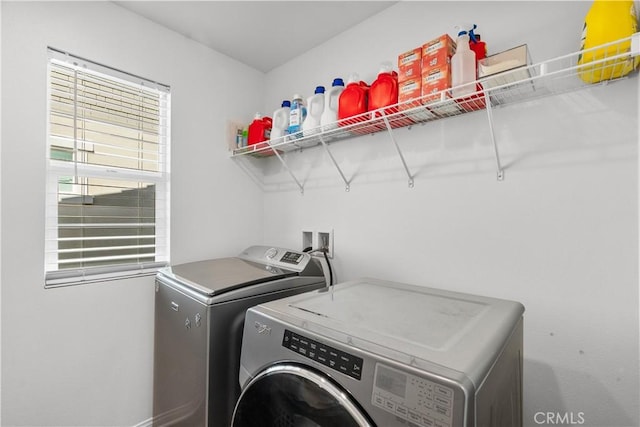 laundry area featuring separate washer and dryer