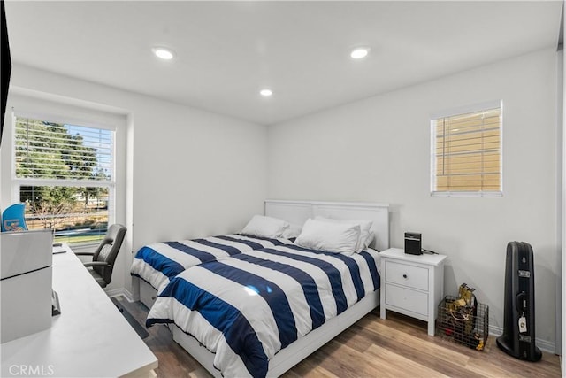 bedroom featuring hardwood / wood-style floors