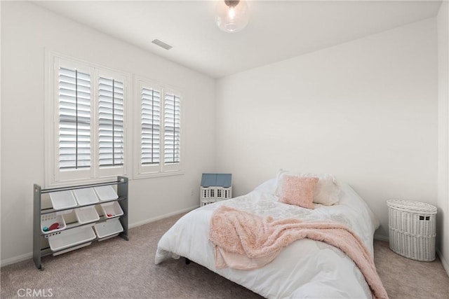 bedroom featuring carpet