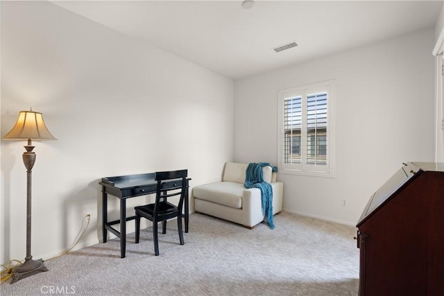 sitting room with light carpet