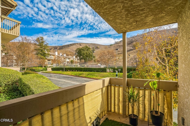 balcony featuring a mountain view