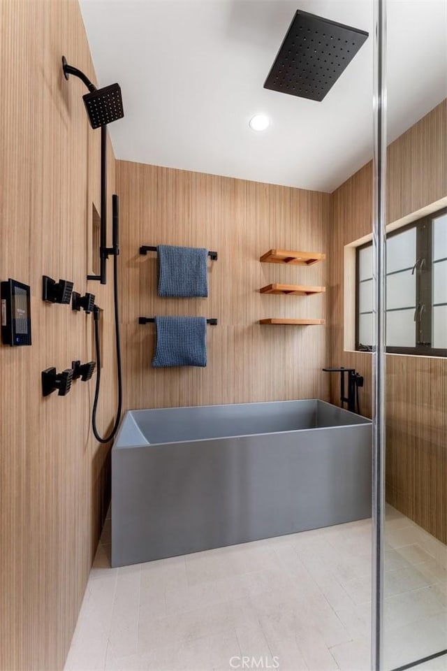 bathroom featuring plus walk in shower and wooden walls