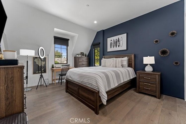 bedroom featuring light hardwood / wood-style floors