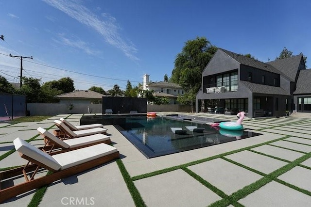 view of pool with a patio area