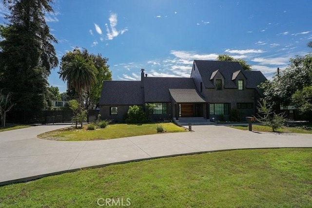 view of front of home with a front yard