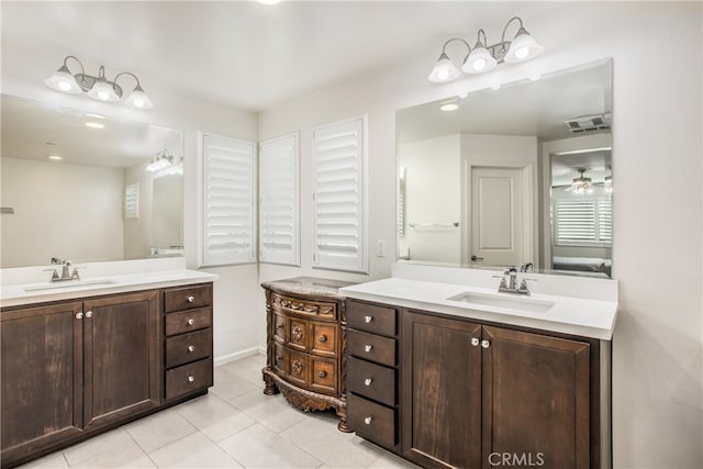 bathroom with ceiling fan, vanity, and tile patterned flooring