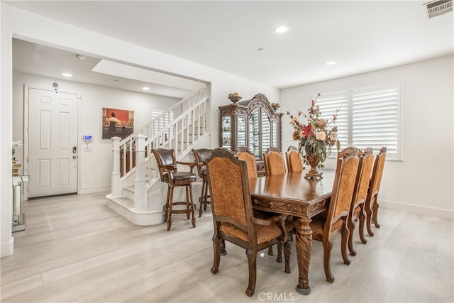 dining room featuring light wood-type flooring