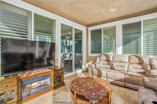 tiled living room featuring wood ceiling