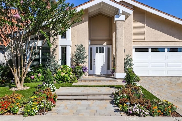 view of front of property featuring a garage