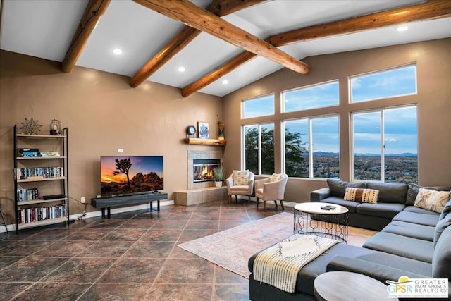 living room featuring vaulted ceiling with beams and a fireplace